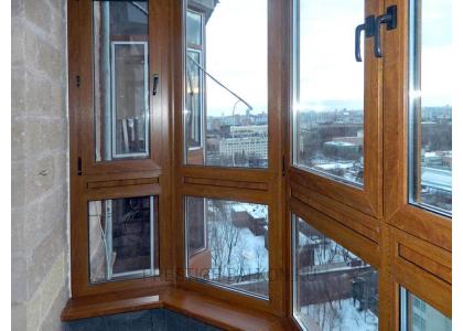 Французское остекление балкона профилем Veka с ламинированием под дерево в Малаховке