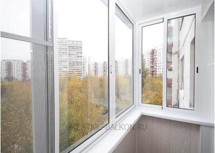 Холодное остекление балкона профилем Provedal с отделкой стен и потолка ламинированными панелями в Малаховке