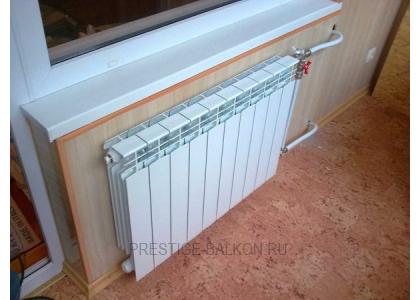 Теплое остекление балкона пластиковыми окнами и установкой масляного обогревателя в Малаховке