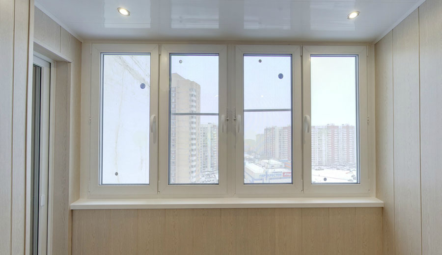 Тёплое остекление балкона профилем КВЕ и отделкой панелями ПВХ в Малаховке